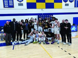 Men’s basketball captures East district title