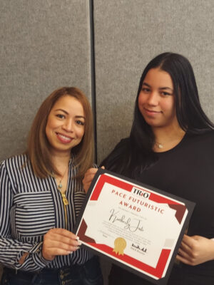 PACE award honoree Kimberly Justo with her certificate and her mother Kendy Bastardo at the awards ceremony.
