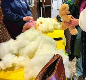 White stuffing for the stuffed animals is shown lying on a table in the Spurk building. 