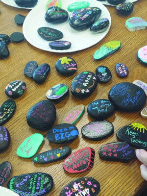 Painted rocks over a table