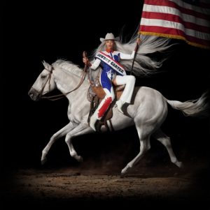 Album cover for Cowboy Carter. Beyonce riding a white horse holding an American flag.