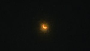 The eclipse is seen from NECCâs Haverhill campus on April 8.
