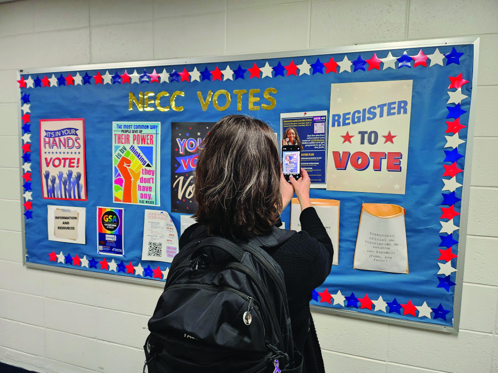 Student takes a picture to the QR code