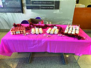 Items in a line on a table, celebrating Winnie the dog's birthday. 