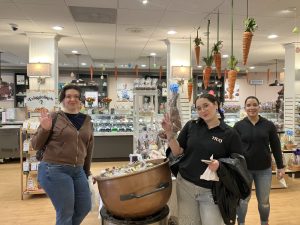 PACE TRIO staff and students shopping inside Van Otis chocolate store.