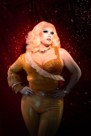 Local drag queen Maddam Zapple posing