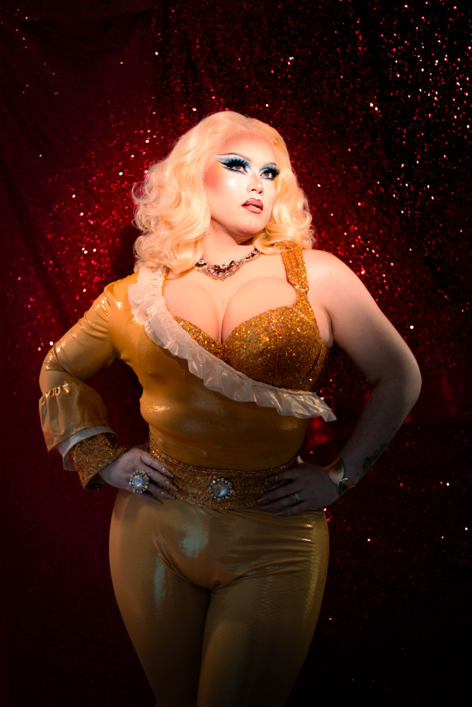 Local drag queen Maddam Zapple posing