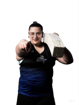 An athlete from NECC is posing to the camera